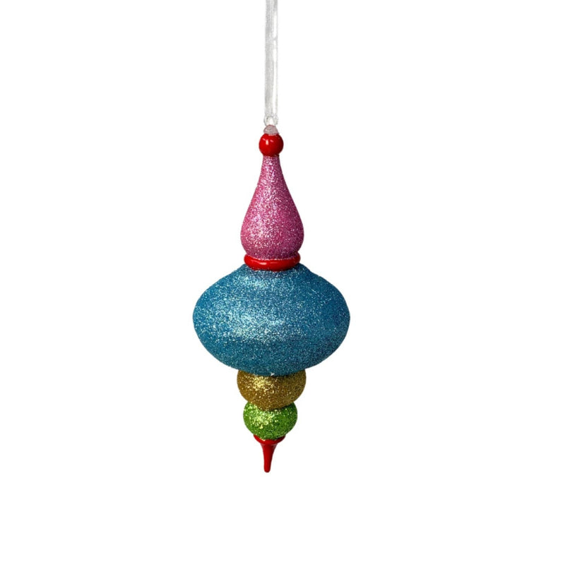 Multicolored glittery Christmas ornament on a white background