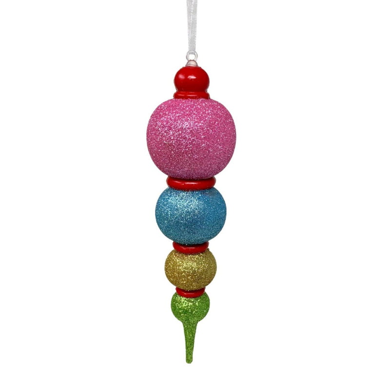Colorful Christmas ornament with pink, blue, gold, and green beads on a white background