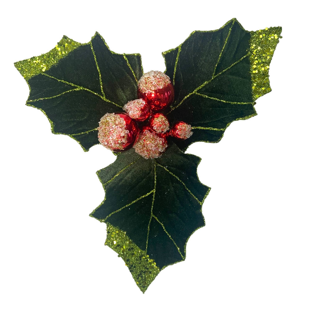 Decorative holly leaf with red berries on a white background