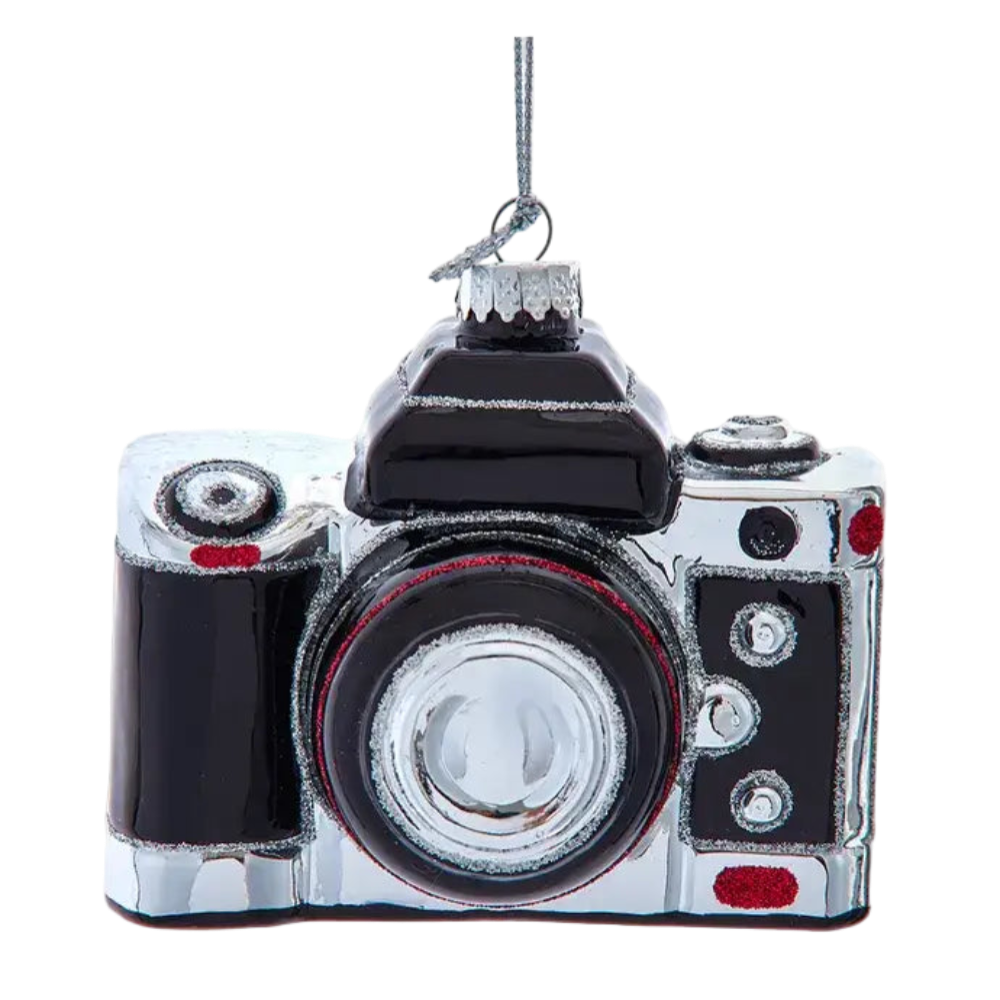 Camera-shaped ornament on a white background