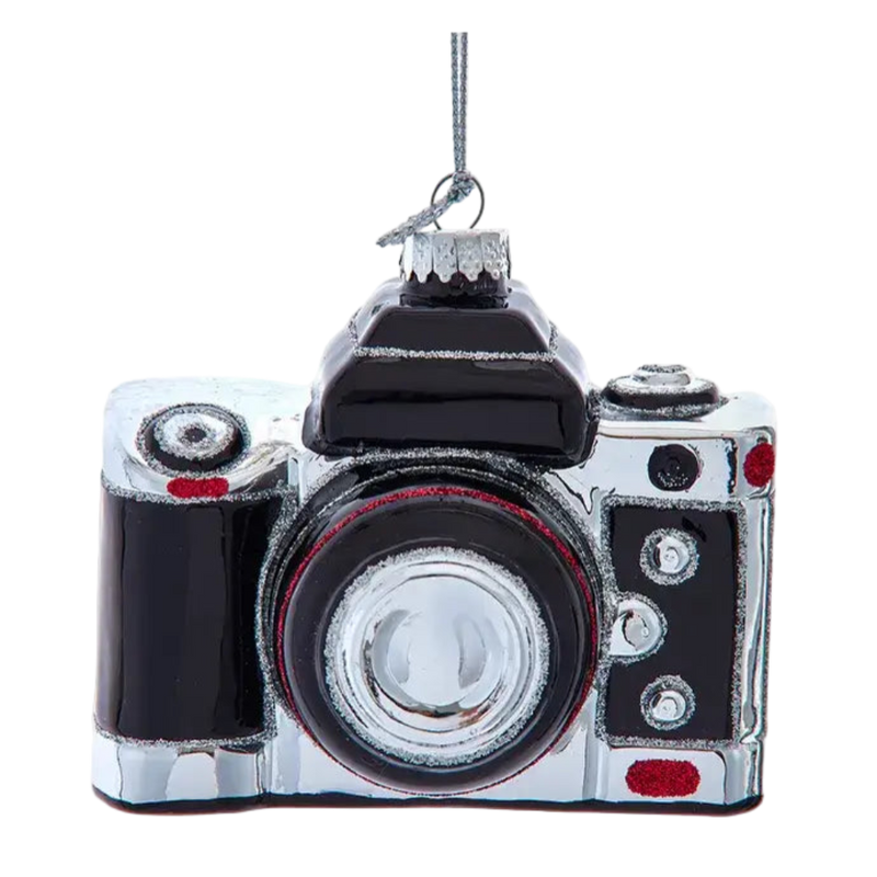 Camera-shaped ornament on a white background