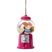 Pink gumball machine ornament with colorful gumballs on a white background