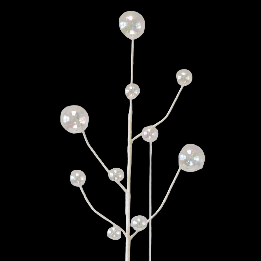 Decorative wall piece with branches and hanging crystals on a light gray background