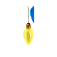 Yellow light bulb with a blue background