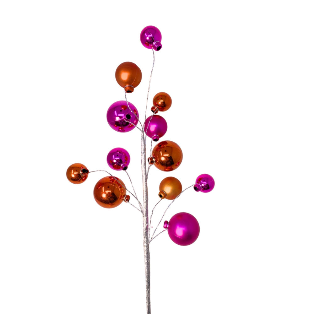 Decorative branch with pink and orange spherical ornaments on a white background