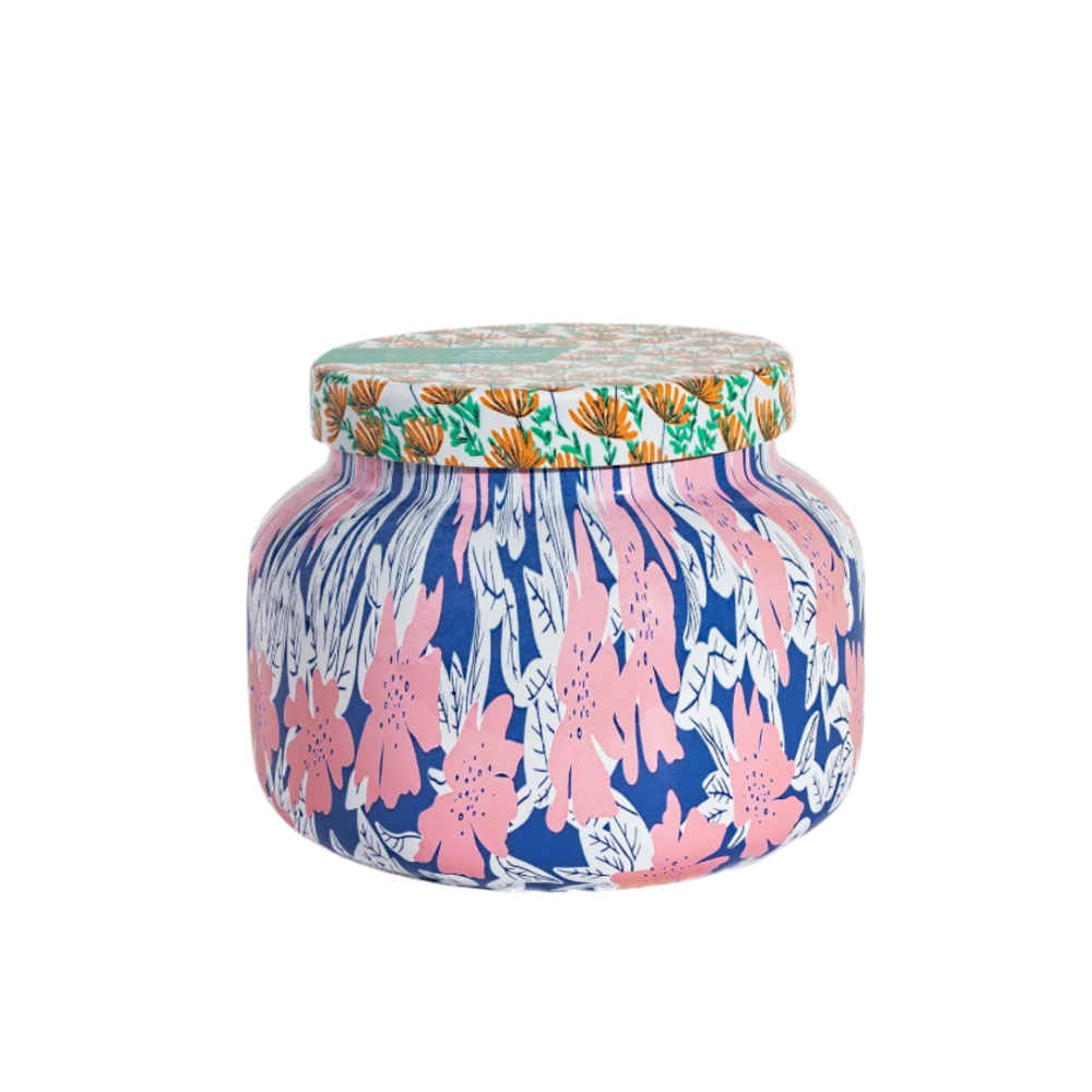 Colorful floral-patterned jar on a white background