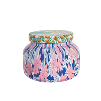Colorful floral-patterned jar on a white background